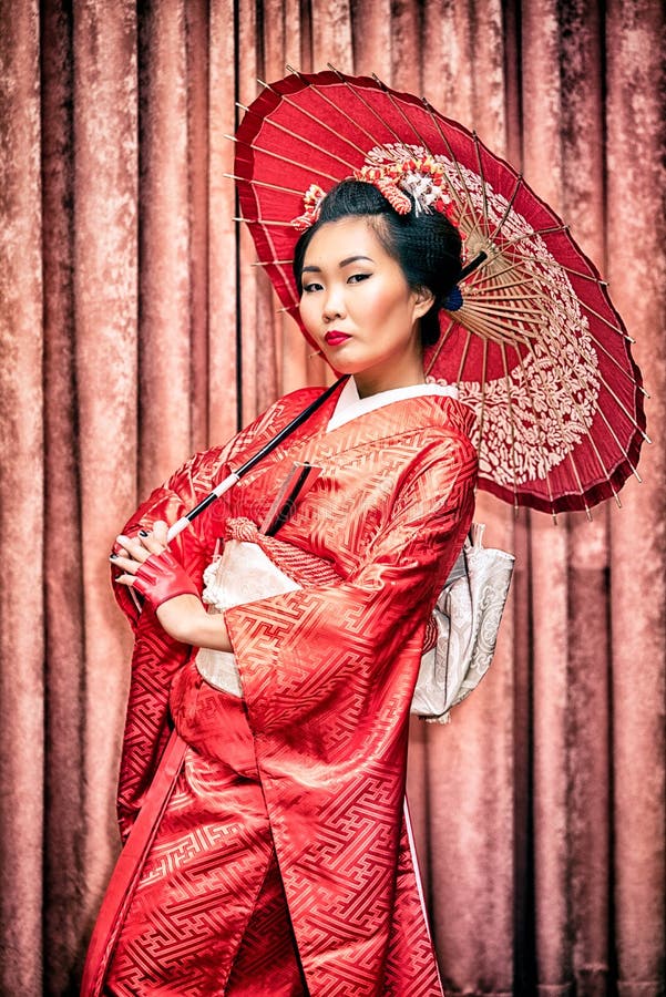 Asian woman wearing traditional japanese kimono. Asian woman wearing traditional japanese kimono