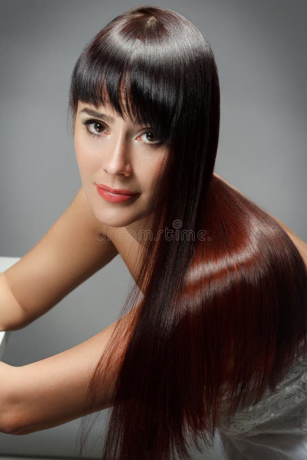 Mulher com cabelo longo do lustro liso fotos de stock Mulher com cabelo longo do lustro liso fotos de stock