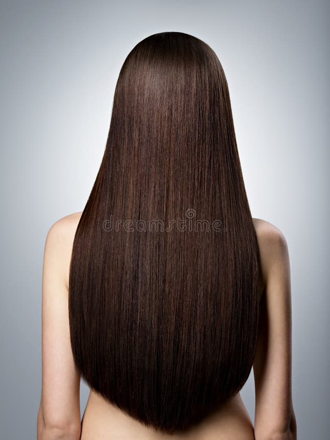Mulher com cabelo reto marrom longo Vista traseira foto de stock royalty free Mulher com cabelo reto marrom longo Vista traseira foto de stock royalty free