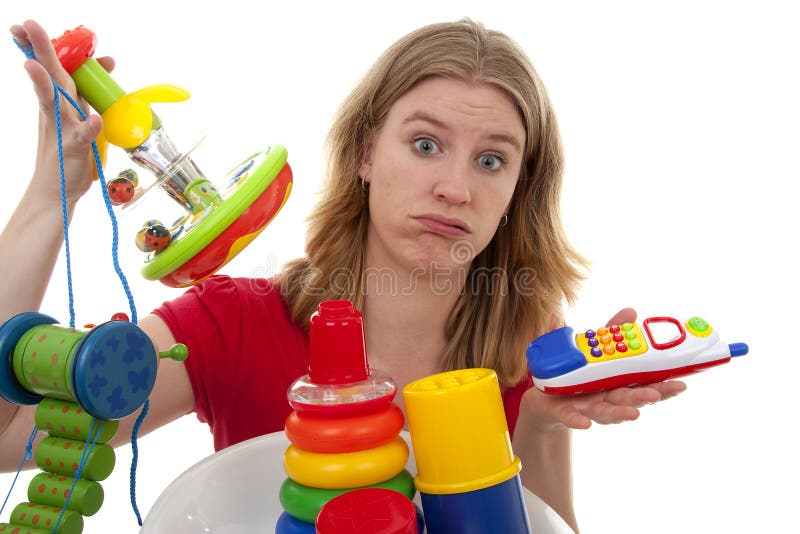 Mulher com lotes dos brinquedos fotos de stock Mulher com lotes dos brinquedos fotos de stock