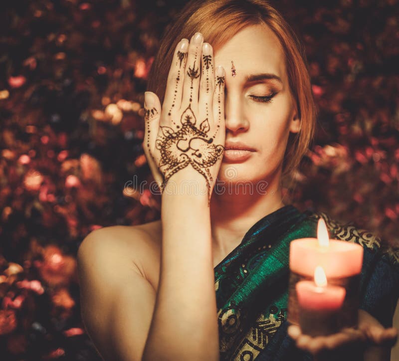 Woman with traditional mehndi henna ornament. Woman with traditional mehndi henna ornament