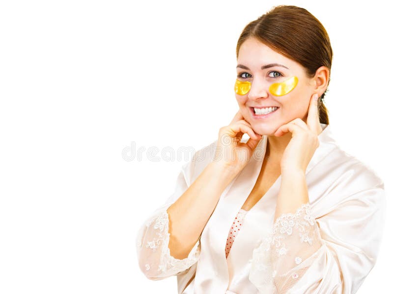 Mulher com os remendos do ouro sob os olhos foto de stock royalty free Mulher com os remendos do ouro sob os olhos foto de stock royalty free