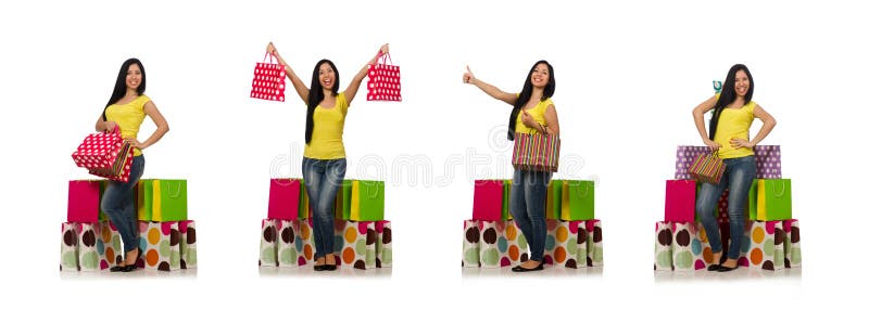 A mulher com os sacos de compras isolados no branco imagem de stock A mulher com os sacos de compras isolados no branco imagem de stock