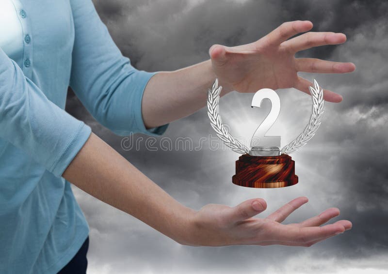 Digital composite of Woman with a trophy on hands. Digital composite of Woman with a trophy on hands