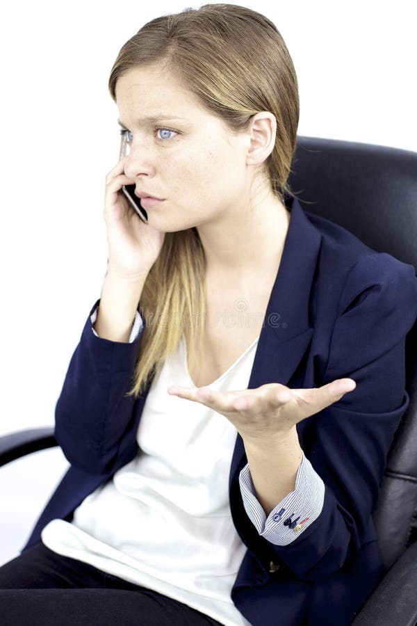 Mulher de negócio preocupada no telefone imagem de stock Mulher de negócio preocupada no telefone imagem de stock