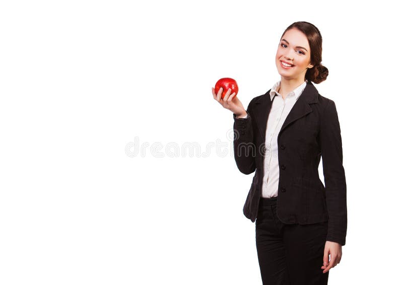 Mulher de negócios de sorriso atrativa que guarda a maçã vermelha, isolada no branco imagens de stock royalty free Mulher de negócios de sorriso atrativa que guarda a maçã vermelha, isolada no branco imagens de stock royalty free
