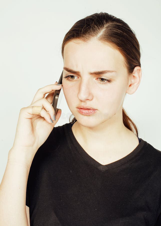 Mulher de negócios moreno consideravelmente real dos jovens que fala no telefone, tendo o fim mau da conversação acima, conceito fotos de stock Mulher de negócios moreno consideravelmente real dos jovens que fala no telefone, tendo o fim mau da conversação acima, conceito fotos de stock