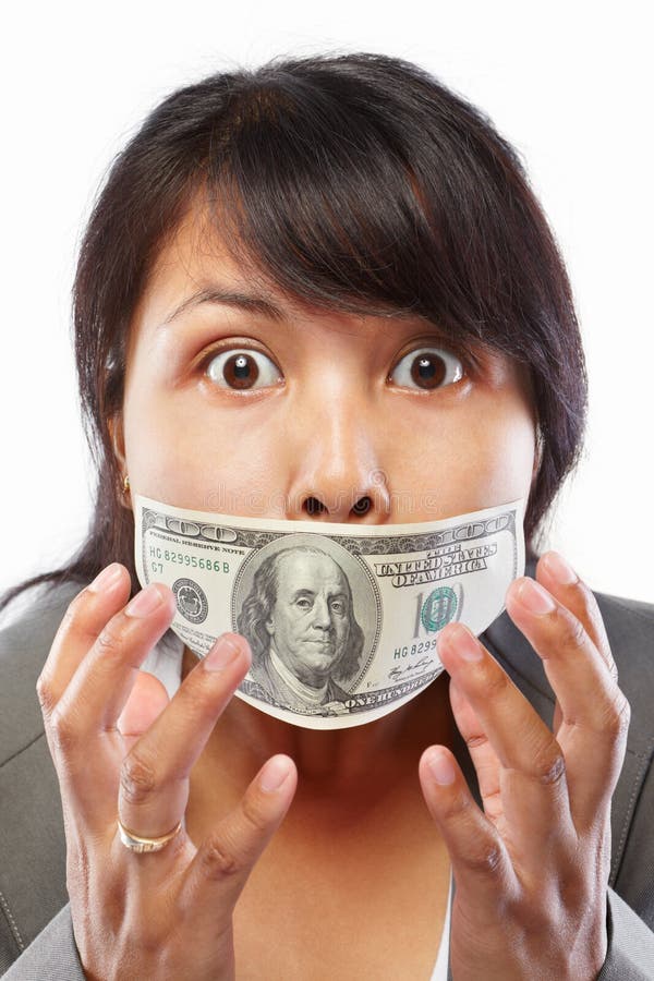 Mulher de negócios que está sendo subornada fotos de stock