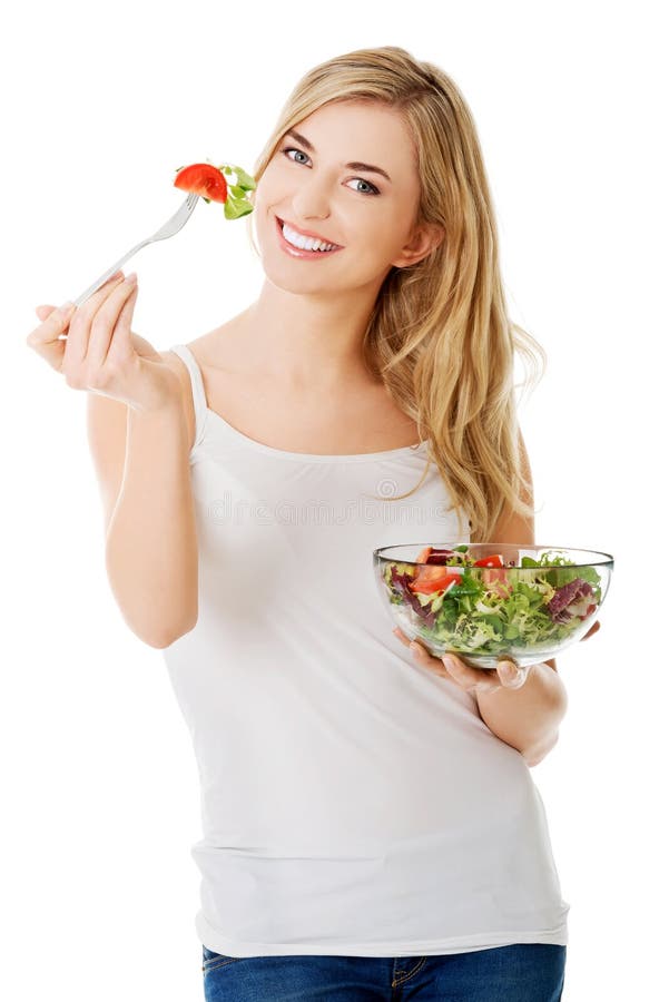 mulher de sorriso que come o salat fotos de stock royalty free mulher de sorriso que come o salat fotos de stock royalty free