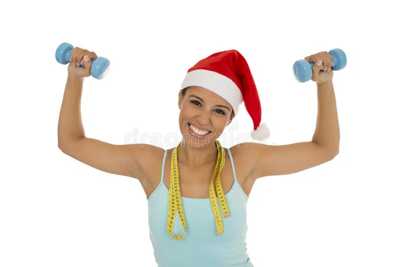 Mulher do esporte na medida da fita da terra arrendada do chapéu do Natal de Papai Noel fotos de stock royalty free Mulher do esporte na medida da fita da terra arrendada do chapéu do Natal de Papai Noel fotos de stock royalty free