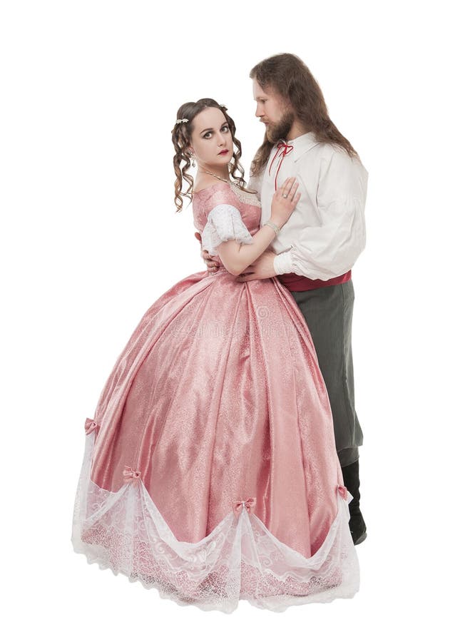 Mulher e homem bonitos dos pares na roupa medieval isolada foto de stock Mulher e homem bonitos dos pares na roupa medieval isolada foto de stock