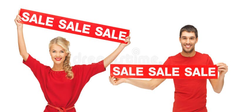 Mulher e homem com sinais vermelhos da venda fotos de stock royalty free Mulher e homem com sinais vermelhos da venda fotos de stock royalty free