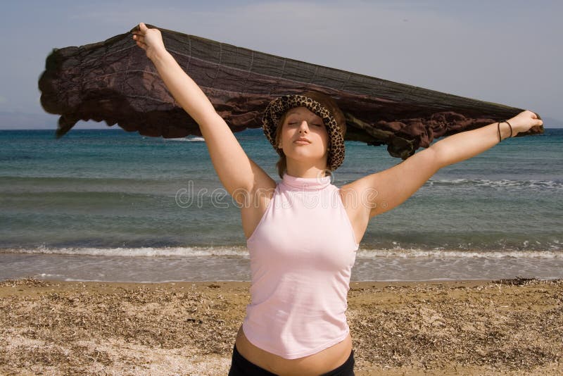 Young woman feeling free in the wind. Young woman feeling free in the wind