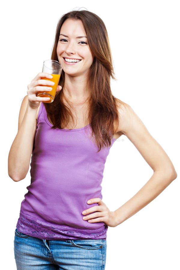 Mulher moreno bonita que guarda o vidro do suco imagens de stock Mulher moreno bonita que guarda o vidro do suco imagens de stock
