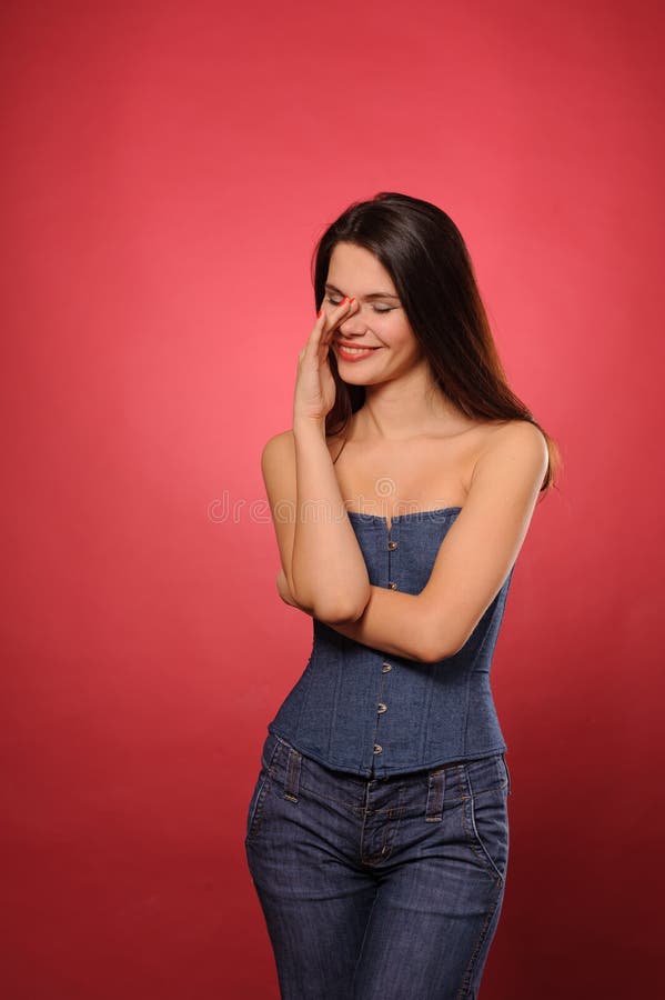 Mulher de calças de ganga foto de stock