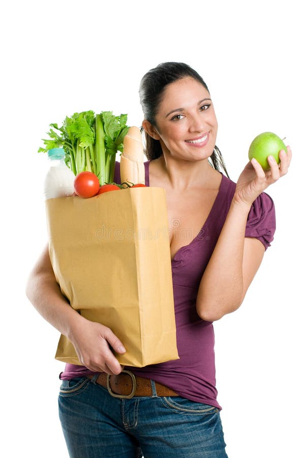 Mulher nova com saco de mantimento e a maçã verde foto de stock Mulher nova com saco de mantimento e a maçã verde foto de stock