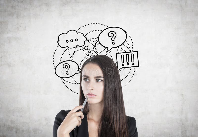 Portrait of a pensive businesswoman with a pen standing near a concrete wall with thought bubbles and speech clouds. Portrait of a pensive businesswoman with a pen standing near a concrete wall with thought bubbles and speech clouds