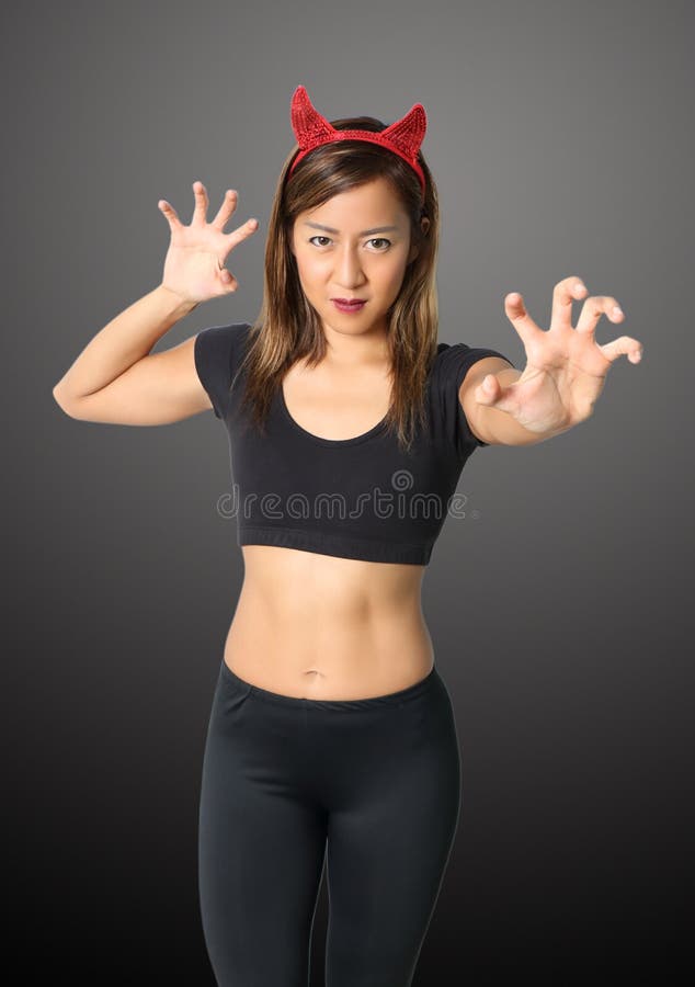 Mulher preta do diabo foto de stock