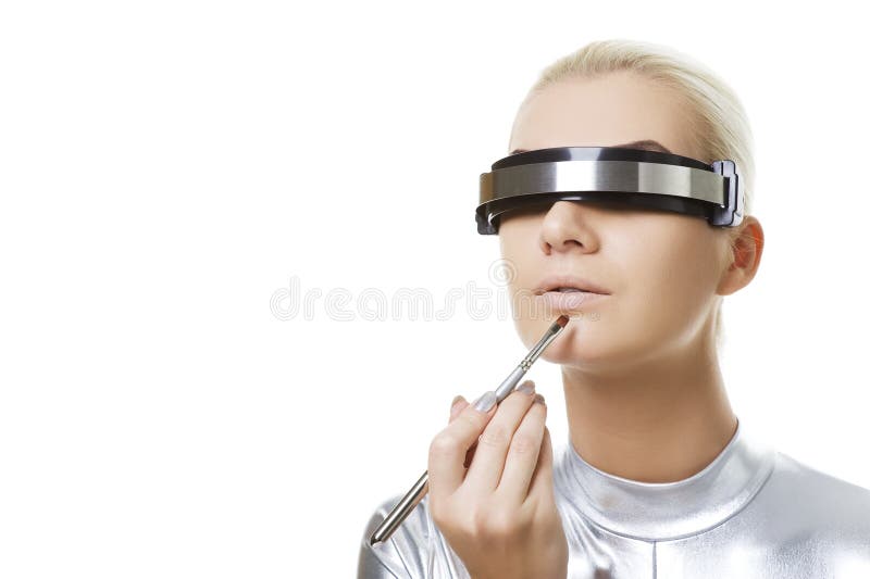 Mulher que aplica o batom imagem de stock royalty free Mulher que aplica o batom imagem de stock royalty free