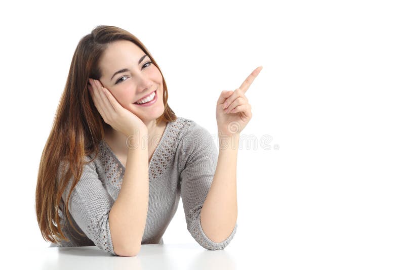 Mulher a apontar e apresentar lateralmente fotografia de stock