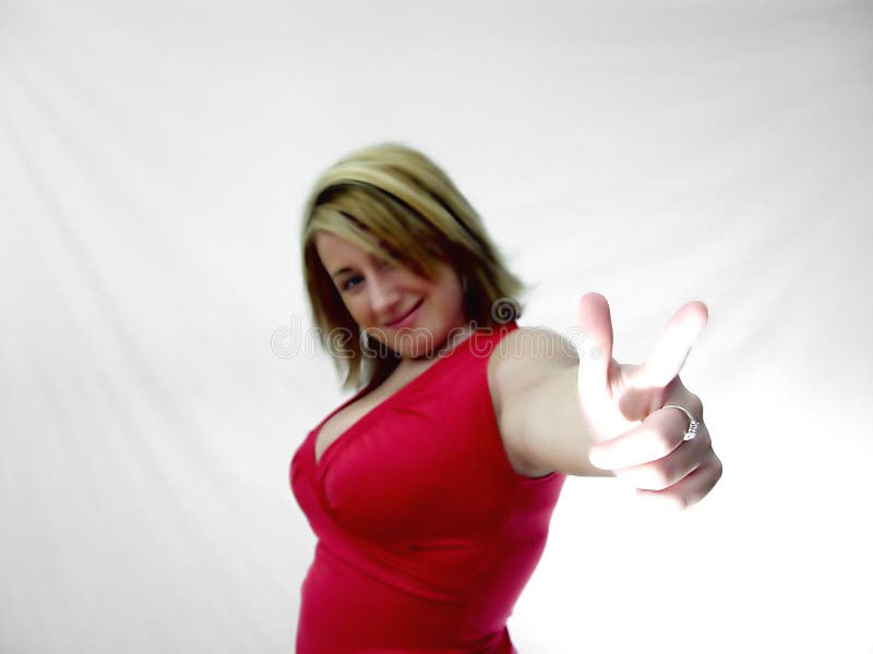 Mulher que aponta seu dedo imagem de stock Mulher que aponta seu dedo imagem de stock