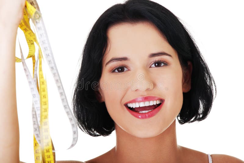 Download Mulher Que Guarda Tipos Da Medida - Foto de Stock - Imagem de modelo, atrativo: 29827248