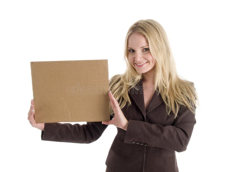 Attractive young blond woman in business attire smiling and holding a blank sign which can be used for copyspace. Attractive young blond woman in business attire smiling and holding a blank sign which can be used for copyspace.