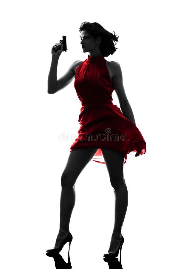 Silhueta de mulher a segurar uma arma foto de stock royalty free