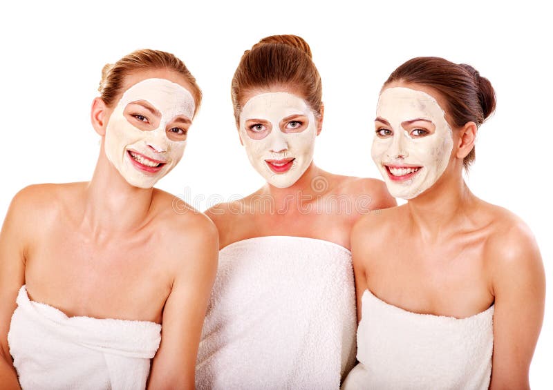 Mulheres do grupo com máscara facial. fotografia de stock royalty free Mulheres do grupo com máscara facial. fotografia de stock royalty free