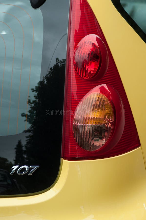 Closeup of Rear Light and Sign Yellow Peugeot 107 Parked in the Street Editorial Image - Image of design, 156469650