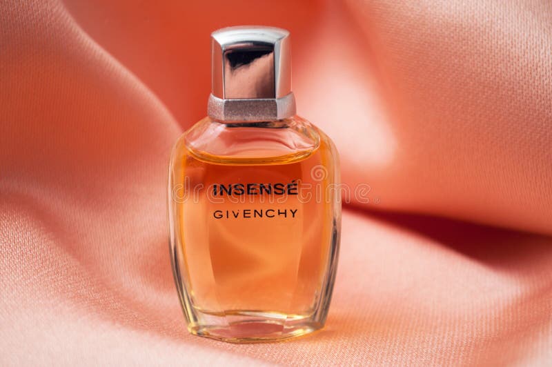 Insense of Givenchy Perfume in a Transparent Bottle on Satin Background  Editorial Stock Image - Image of cologne, incense: 164244759