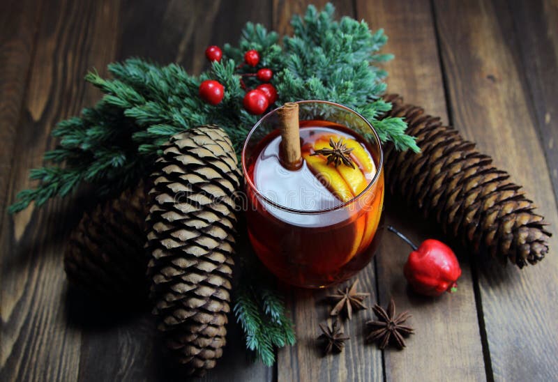 Mulled Wine with Cones with a Jumper with Deer and a Knitted Scarf, a