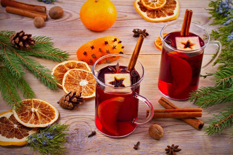 Mulled Wine Hot Drink with Spices, Citrus Fruits and Apples. Seasonal ...