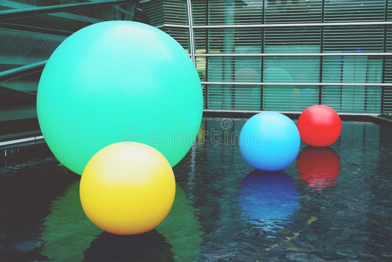 Multi color balls on the water pool. background stock photos Multi color balls on the water pool. background stock photos