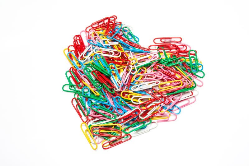 Multi color paper clips arranged in heart shape