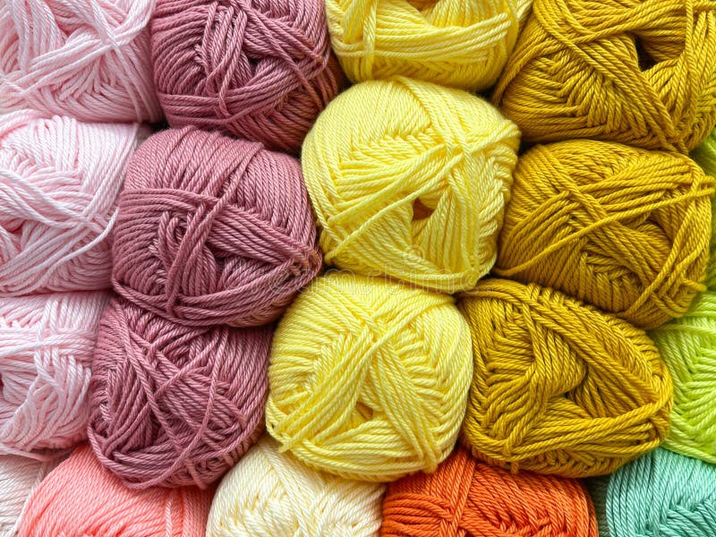 Multi Colored Balls of Yarn for Knitting. Woolen Threads for Needlework