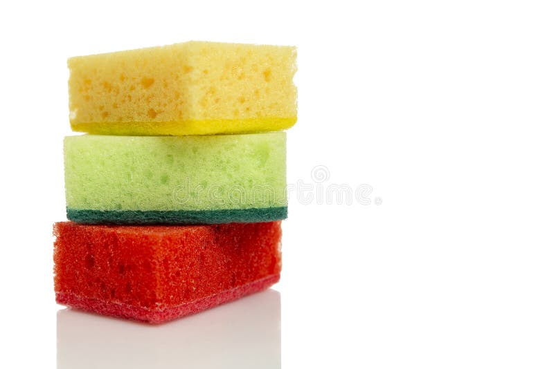 Multi-colored bright sponges for cleaning. Kitchen assistants in the fight for cleanliness. Isolated on white background. Space for text. Multi colored foam sponges stock images, royalty-free photos and pictures