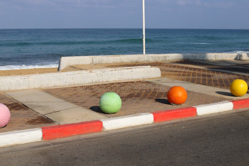 Concrete Balls On The Sidewalk Stock Image - Image of summer, pavement