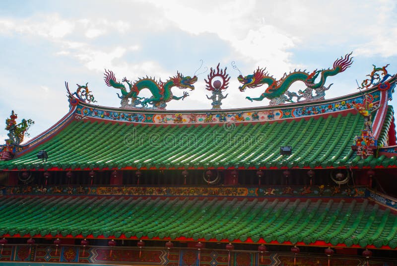 Multi-colored dragons on the roof. Chinese Temple Tua Pek Kong. Miri city, Borneo, Sarawak, Malaysia