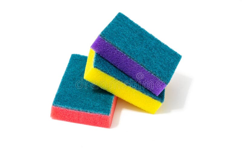 Multi-colored sponges for washing dishes on a white background. Multi colored foam sponges stock images, royalty-free photos and pictures