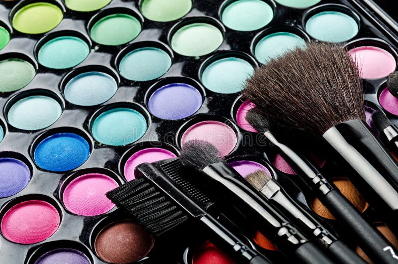 Multi colored make-up and brushes