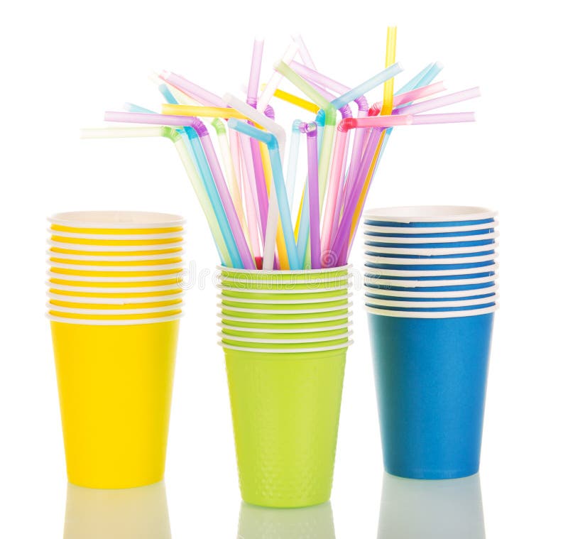 Multi-colored paper cups and cocktail straws isolated on white