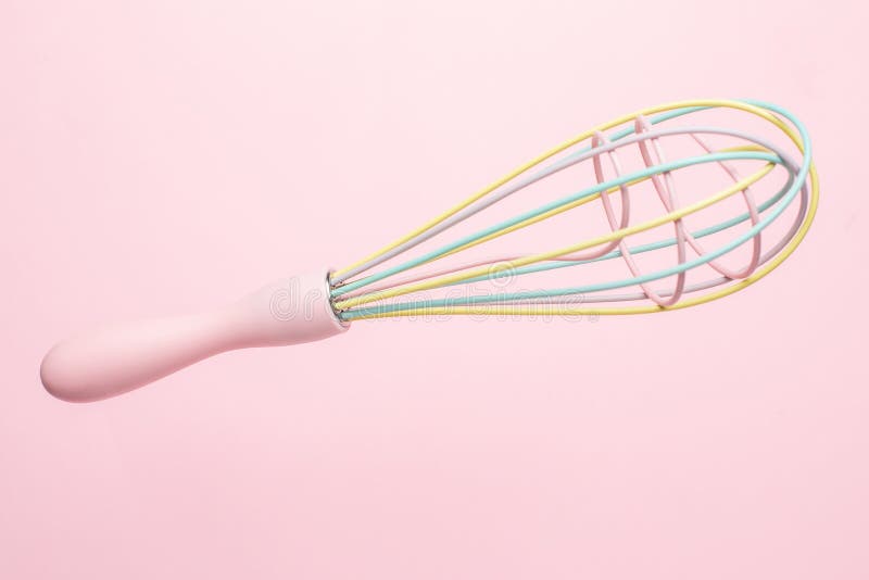 Multi-colored pastel kitchen whisk on pink background, cute kitchen utensils,  feminine cooking Stock Photo by sablyaekaterina