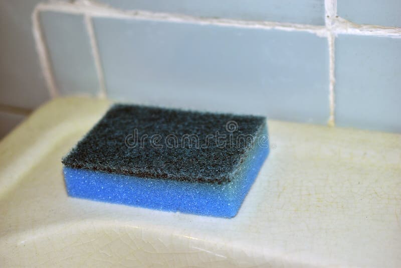 Multi-colored sponges for cleaning in the bathroom on the sink. Washing sponge for dishes is an indispensable assistant in the kitchen, which is used by everyone without exception. such a product has different shapes and is also made of different materials, which distinguishes their applications and special functions. In order for cleaning to be effective, it is necessary to clearly understand the purpose of the washing sponge, so as not to be disappointed in the result. Sponges for washing dishes. 1. Foam; 2. abrasive; 3. metal; 4. plastic; 5. microfiber; 6. melamine; 7. cellulose. Multi colored foam sponges stock images, royalty-free photos and pictures