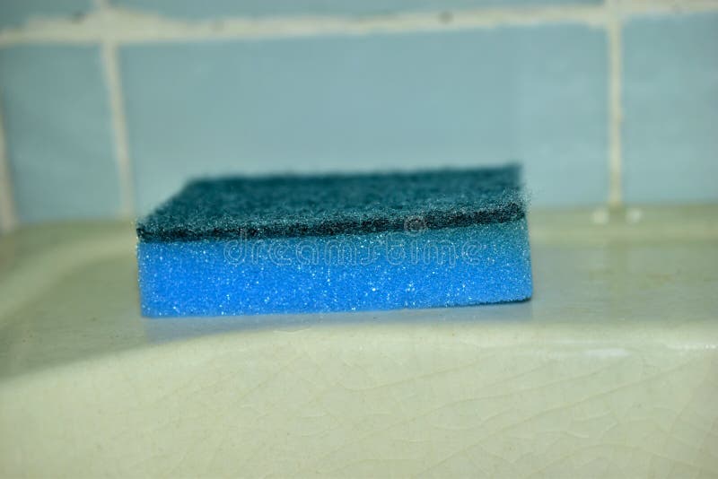 Multi-colored sponges for cleaning in the bathroom on the sink. Washing sponge for dishes is an indispensable assistant in the kitchen, which is used by everyone without exception. such a product has different shapes and is also made of different materials, which distinguishes their applications and special functions. In order for cleaning to be effective, it is necessary to clearly understand the purpose of the washing sponge, so as not to be disappointed in the result. Sponges for washing dishes. 1. Foam; 2. abrasive; 3. metal; 4. plastic; 5. microfiber; 6. melamine; 7. cellulose. Multi colored foam sponges stock images, royalty-free photos and pictures