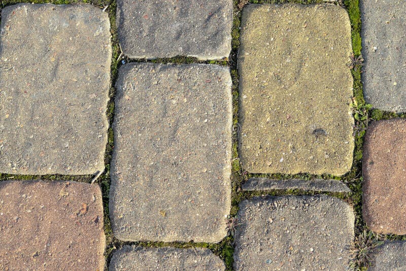 Multicolored Stone Tiles on the Ground. Floor Covering. Stone Texture