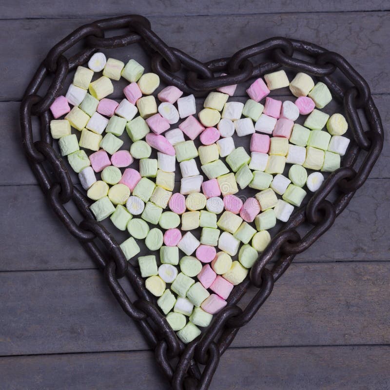 Multi Colored Tasty Marshmallows Chained in Shape of Heart. Flat Lay