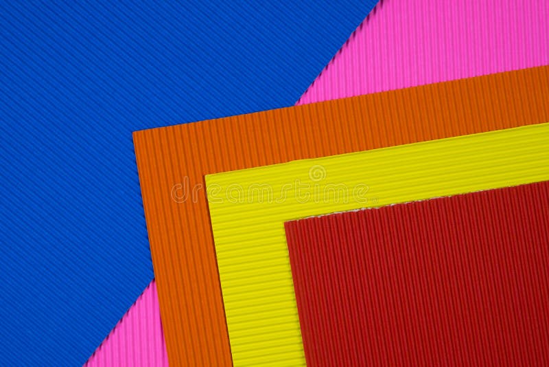 Multi coloured corrugated paper texture, use for background. vivid colour with empty space for add text or object.