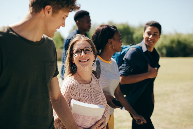 Multi-ethnic college students at campus royalty free stock images Multi-ethnic college students at campus royalty free stock images