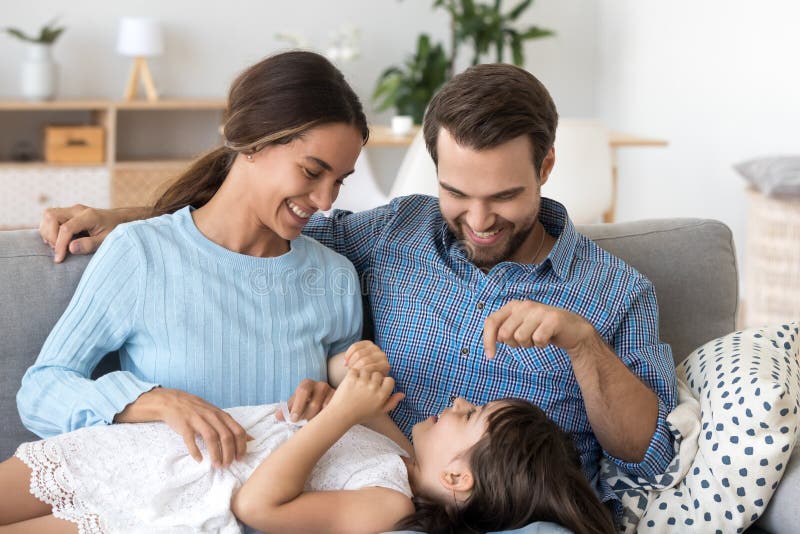 Multi-ethnic family have fun play at home stock image Multi-ethnic family have fun play at home stock image